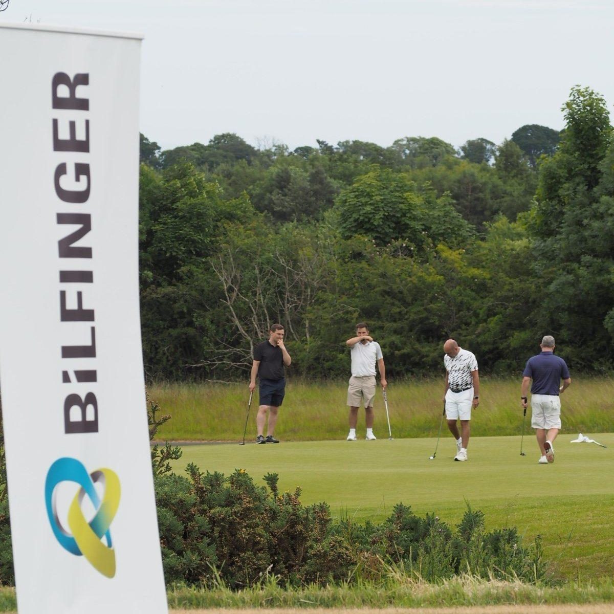 2023 Golf Day Bilfinger Flag and Golfers
