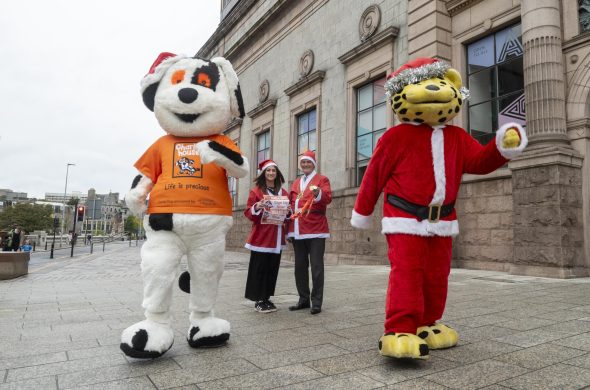 Image 1 Step into the Santa Run L R Charlie Dog Katie Bremner Santa Run Organiser Charlie House Lord Provost Dr David Cameron Spotless the Leopard 1